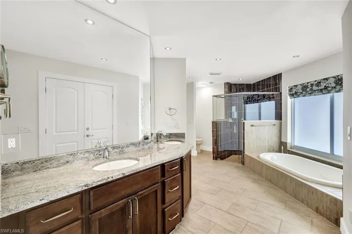 Primary bathroom offers plenty of room with large double vanity