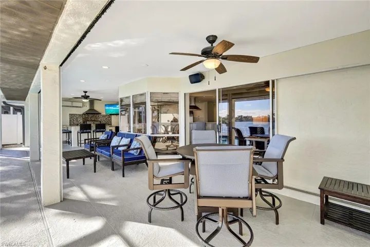 Huge under truss lanai allows you to escape from direct sun while entertaining