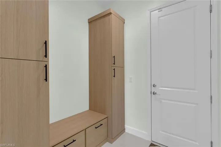 Garage Entry with Custom Cabinets!