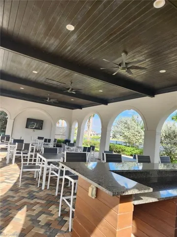 View of patio featuring ceiling fan and outdoor dining space