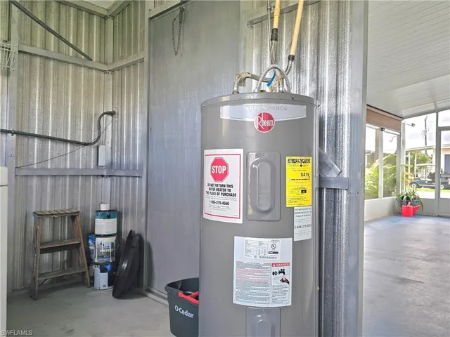 Utility room with electric water heater