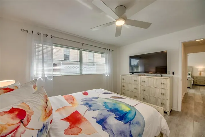 Bedroom featuring light wood finished floors and ceiling fan