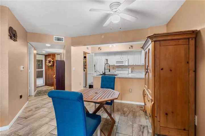 Dining space featuring ceiling fan