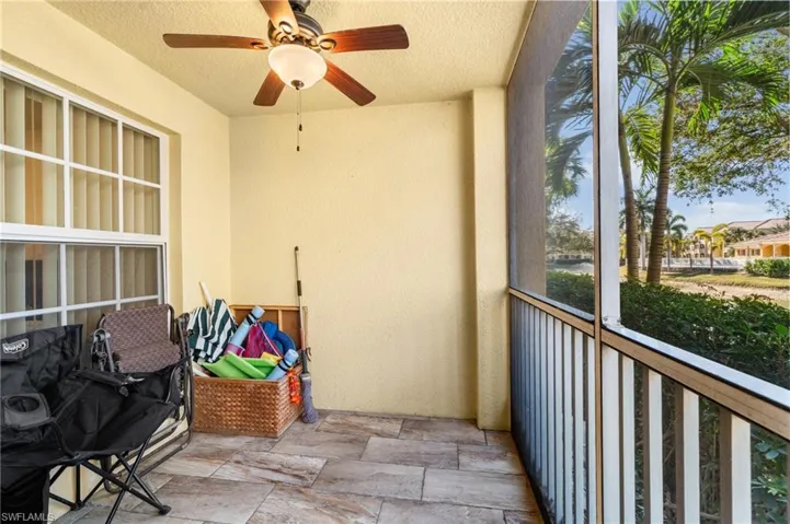 Balcony featuring ceiling fan