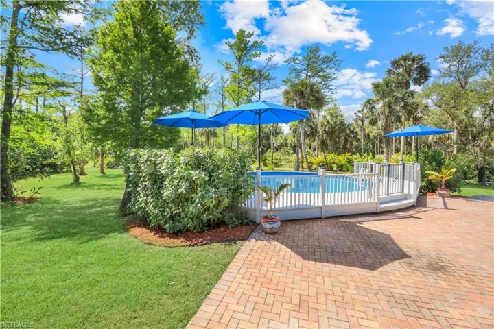 CHARMING COUNTRY LIFE, WITH EASY ACCESS TO EVERYTHING, COMING SOON WITH VANDERBILT BEACH RD EXTENSION