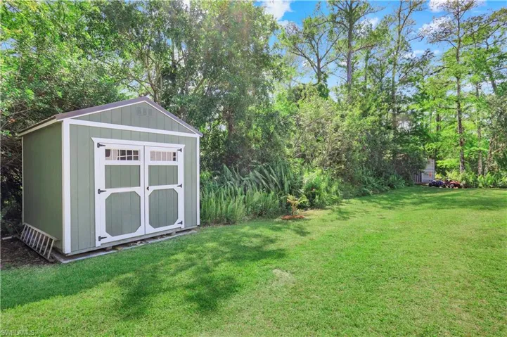 THIS IS ONE OF 3 SHEDS, PERFECT FOR OFF SEASON CLOTHES, HOLIDAY DECORATIONS, TOYS, OVERFLOW STORAGE