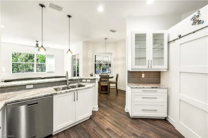 WHITE CABINETS, BARN DOOR WALK IN PANTRY