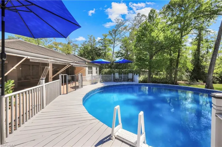 MEDALLION POOL WITH CUSTOM WRAP AROUND DECK