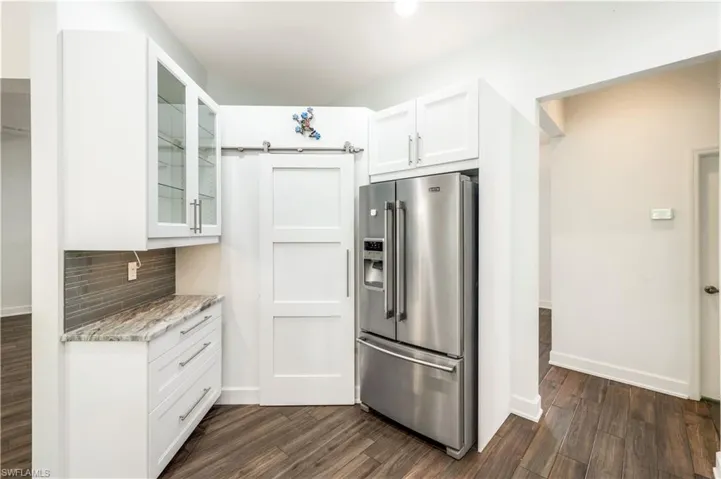 GLASS FRONT CABINETS, UNDER CABINET LIGHT, BARN DOOR WALK IN PANTRY