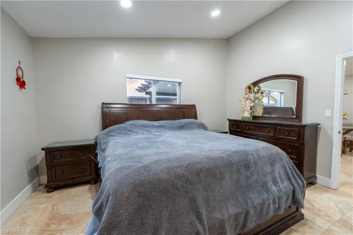 Bedroom with recessed lighting