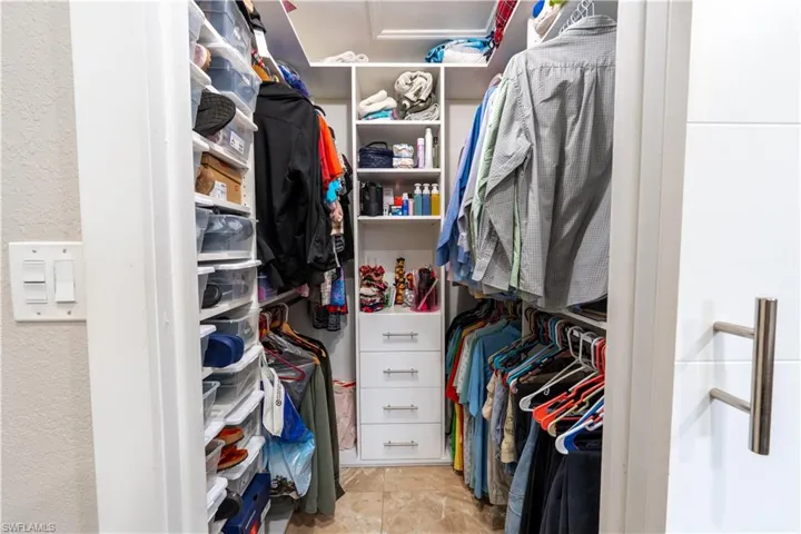 Spacious closet with attic access