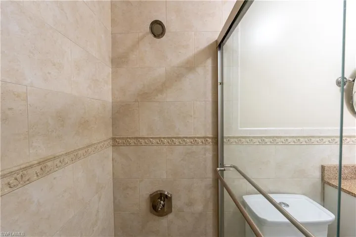 Bathroom with tiled shower
