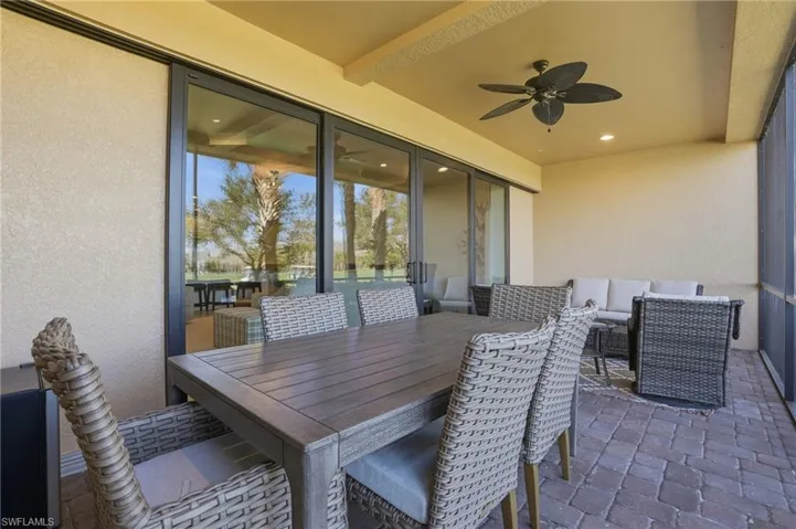 View of patio / terrace featuring ceiling fan, an outdoor living space, and outdoor dining space