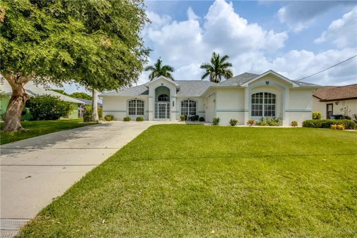 Beautiful Curb appeal with your Long Driveway and Side Load Garage