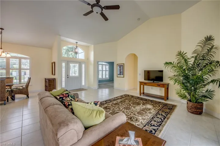 Note the Transom Windows that bring in extra light over the doorways and windows.  The  opening to the right of the front door is the entrance to the 4th Bedroom/office.  A generous closet is provided.