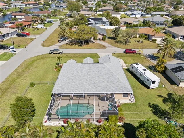 Aerial view of residential area with a pool