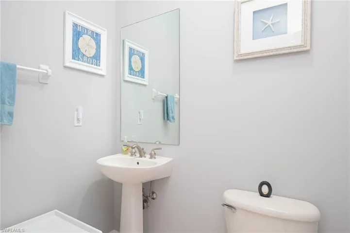 Bathroom featuring toilet and sink