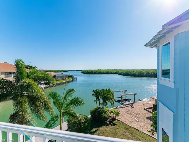 Water view with a dock