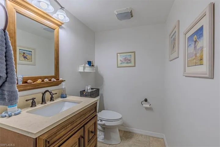 Bathroom featuring vanity and light tile patterned floors