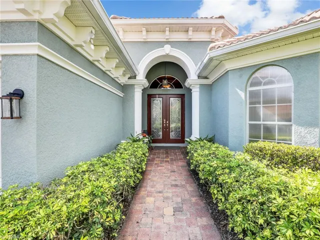 Property entrance with french doors