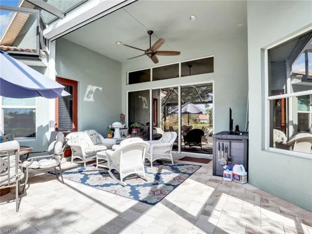View of patio featuring ceiling fan