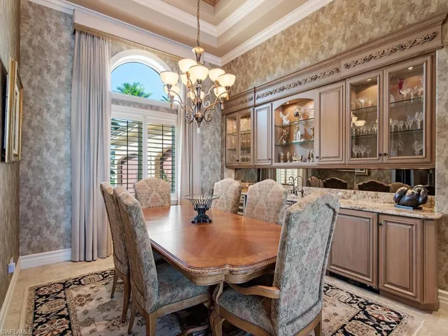 Formal dining room with built ins and wet bar