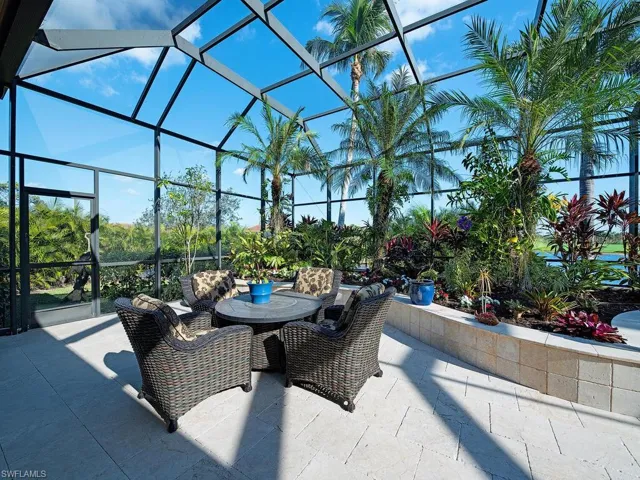 Lanai sitting area with lush Florida plantings...............