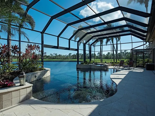 Pool and hot tub with wide open views of lake and golf course