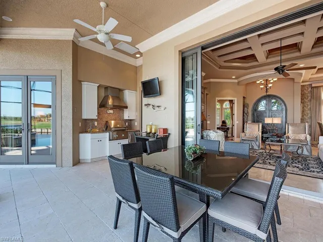 Undercover dining next to built in kitchen area