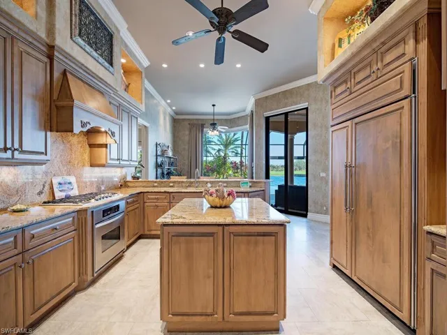 Kitchen with island and high end appliances
