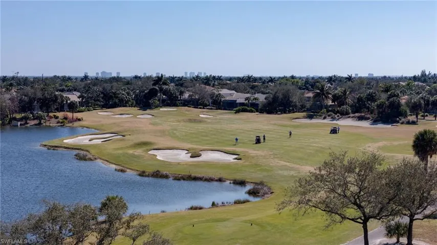 Aerial view of a nearby body of water and a golf course