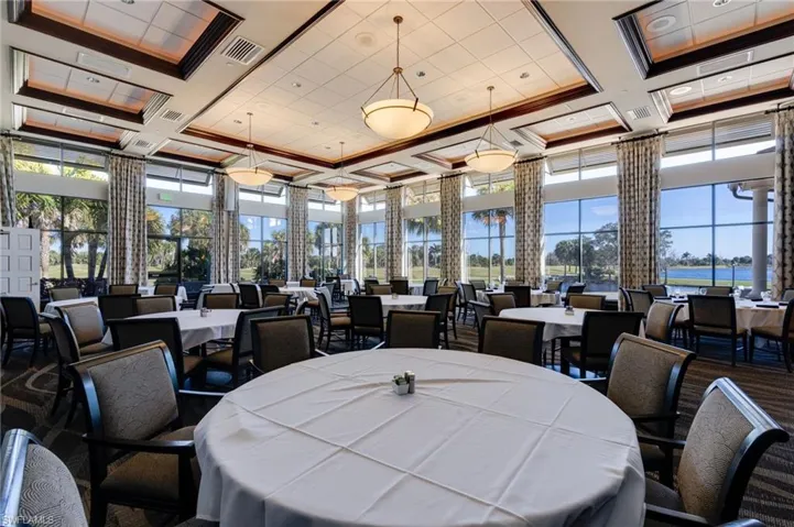 Dining space featuring coffered ceiling
