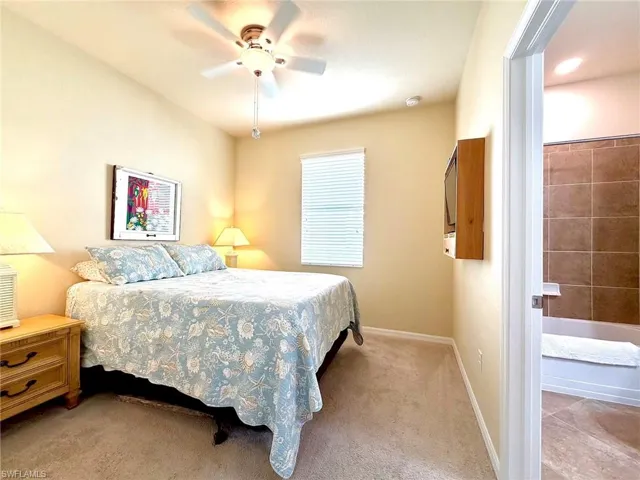 Bedroom featuring carpet floors and ceiling fan