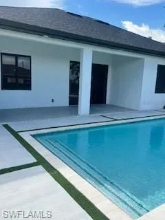 Swimming pool featuring a patio