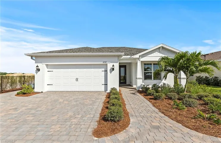 Single story home with a garage