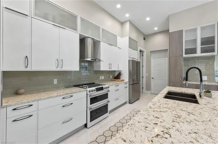 Kitchen View facing Laundry Room and Garage