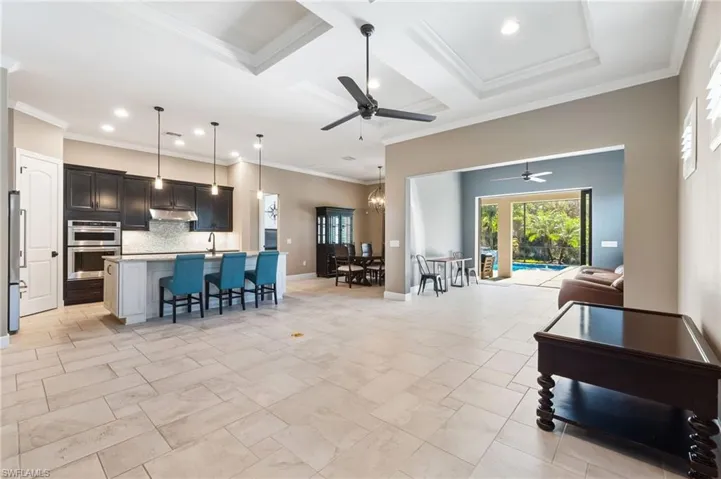 Living room with view of kitchen and dining room