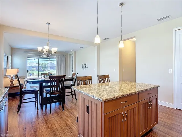 Island and all cabinets have slide out shelf for convenience.