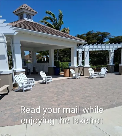 Lakefront relaxing while reading the mail.