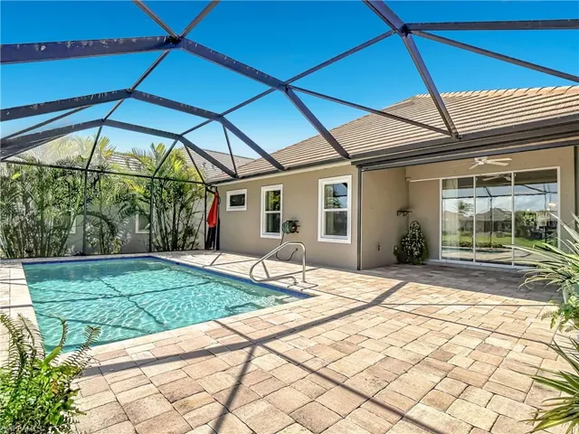 Screen & lanai extend width of home