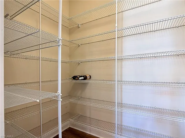 Pantry located next to kitchen island