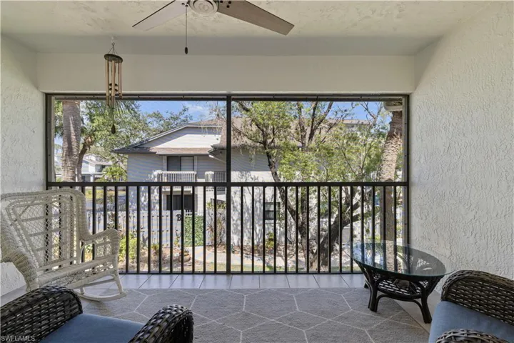 Sunroom featuring healthy amount of natural light