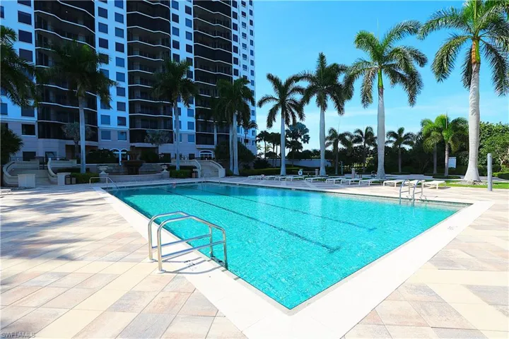 Community pool featuring a patio