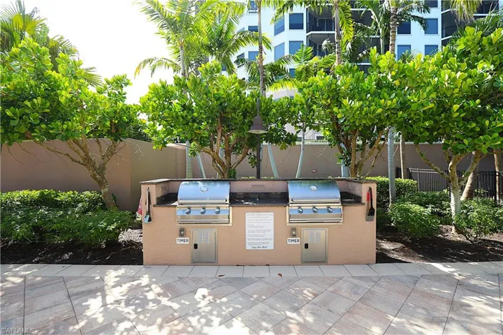 View of patio featuring area for grilling