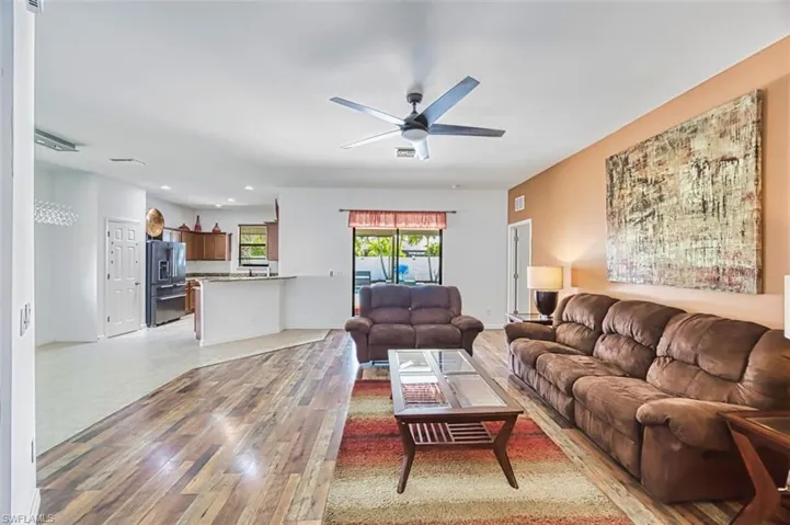 Open Concept living overlooking the lanai/pool area