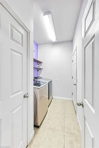 separate utility room with washer and dryer included