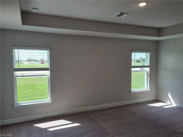 Spare room with carpet floors