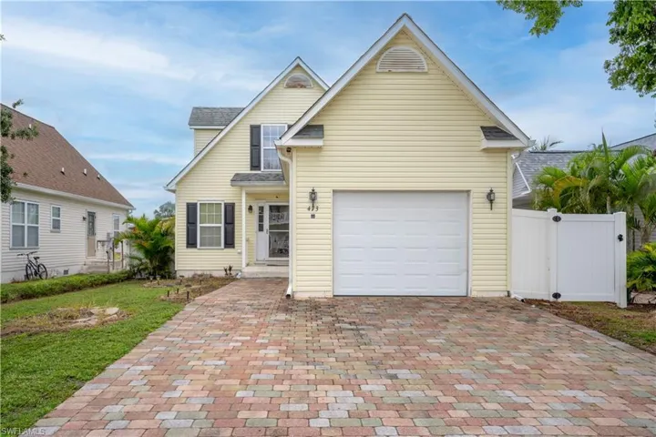 View of front of home with a garage