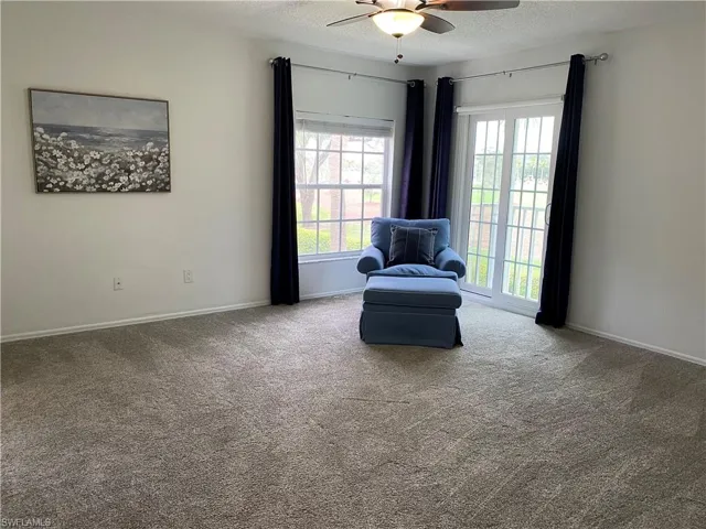 Primary bedroom partially furnished