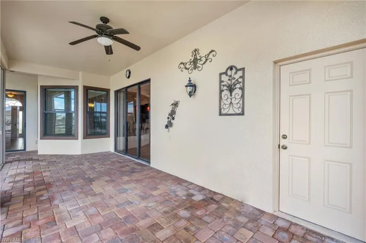 View of patio with ceiling fan